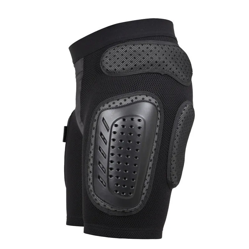 Black cycling hip protection pants with integrated pad, shown laid flat.