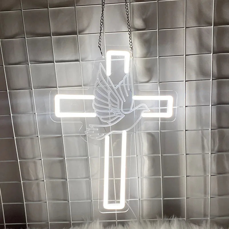 Acrylic LED neon light plate with peace dove cross design emitting white light on a dark background