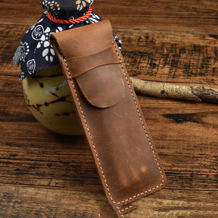 Brown vintage leather pencil case measuring 16x6cm open showing interior