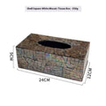 Natural shell decorative storage box tissue holder in square and rectangular shapes on a table.