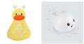 White and blue electric whale bath toy spraying water with flashing lights on a bathroom surface.