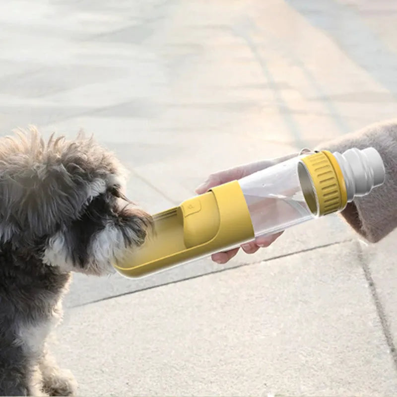 Dark blue portable dog water bottle with built-in drinking bowl, shown with leak-proof lock.