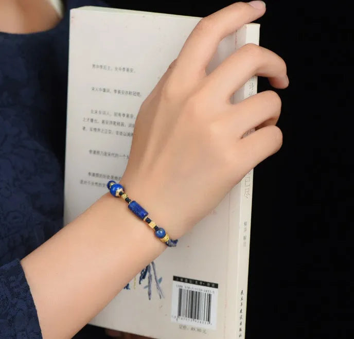 Hand woven DIY watch bracelet with lapis lazuli coloured rope and flexible wire in an ethnic style.