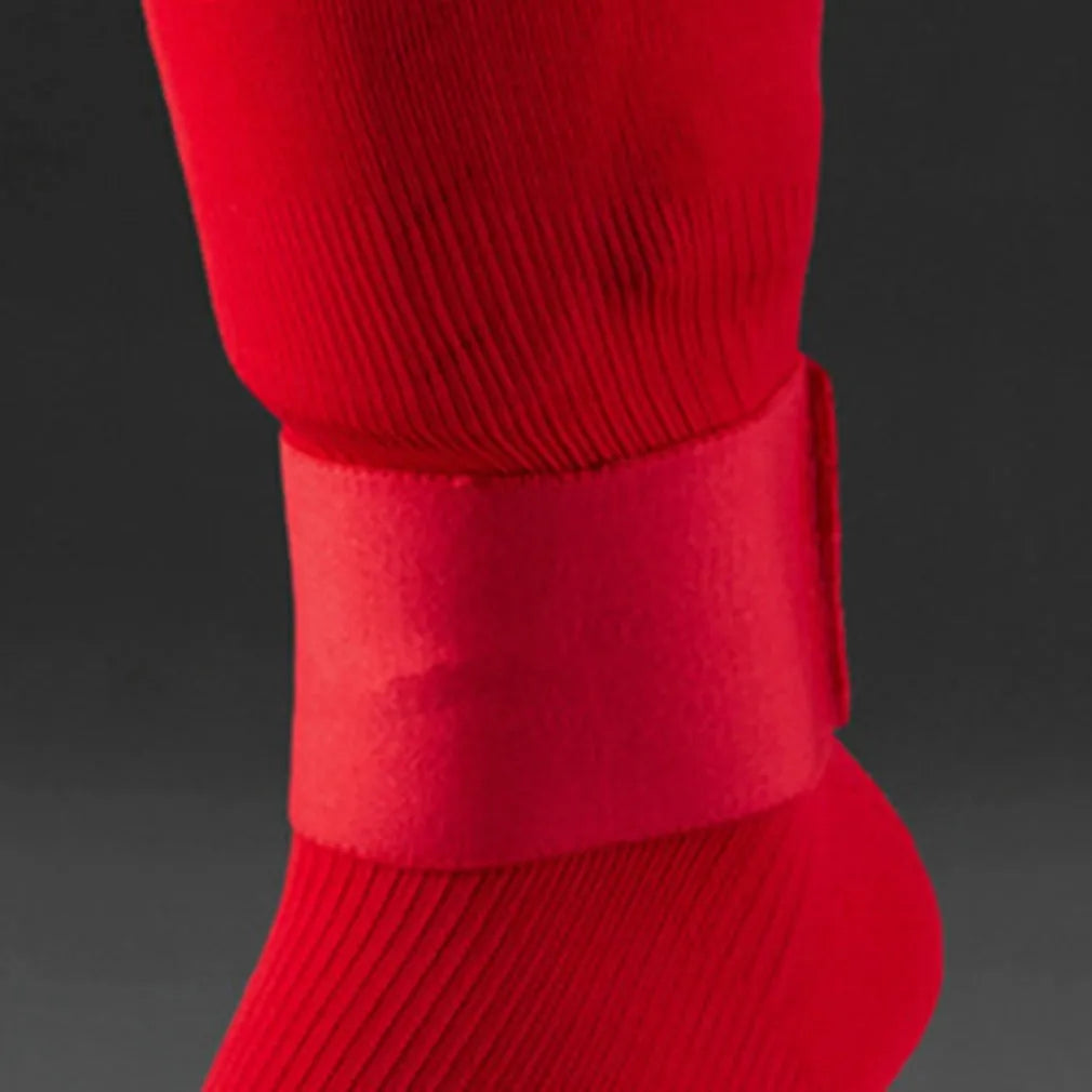 Rubber football shin guard tape belt measuring 25x6.5cm in four colour options