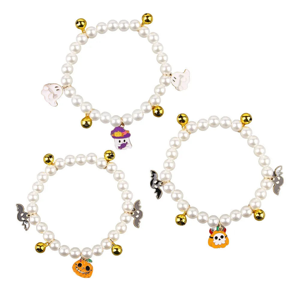 Halloween cat collar with simulated pearl necklace decoration showing pumpkin designs including purple ghost, skull, and smiling pumpkin patterns