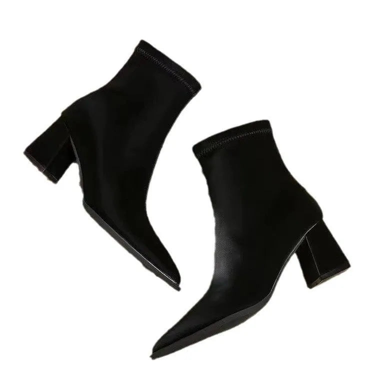 Women's pointed toe boots in stretch artificial suede with mid-heel wedge design