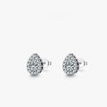 Close-up of a pair of women's silver water drop shaped ear studs on a plain background.