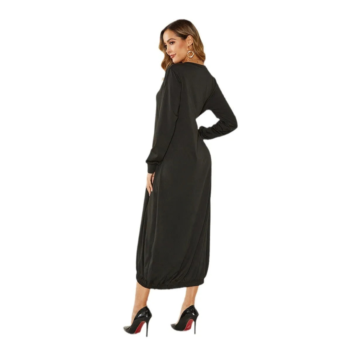 A loose, long black lantern dress with a lace-up crew neck on a mannequin.