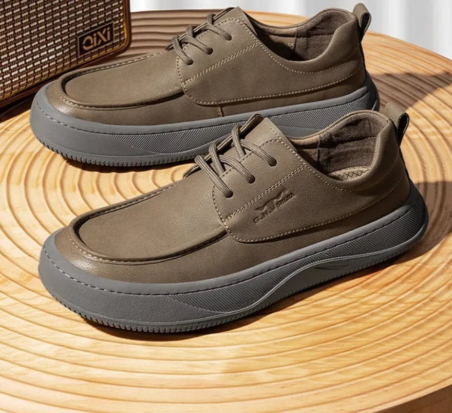 British retro style brown leather casual shoes with big toe design on a white background.