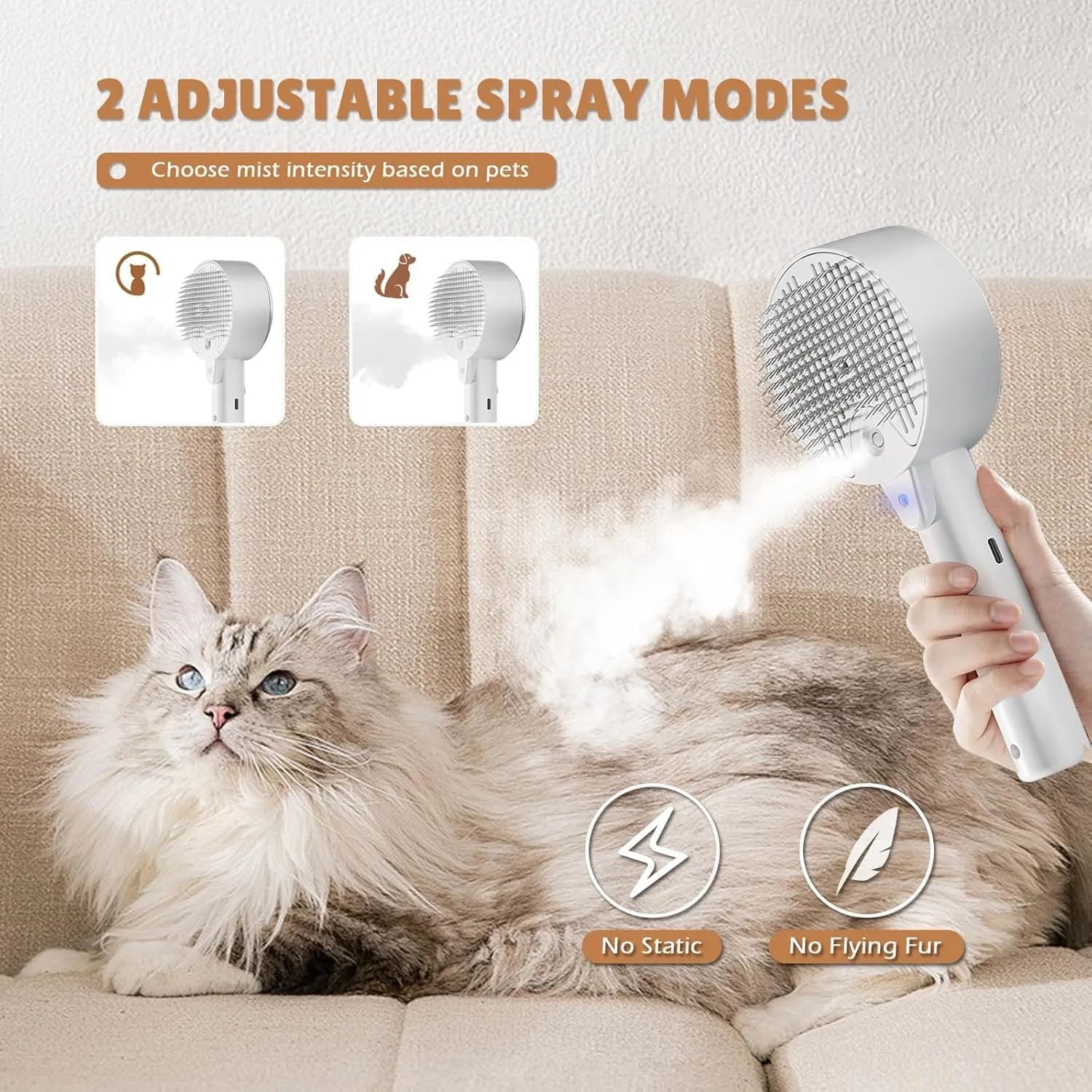Pink and white cat steam grooming brush with mist spray function and stainless steel comb.