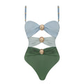 Women's sleeveless one-piece swimsuit with hollow out stitching and round buckle decoration in green.