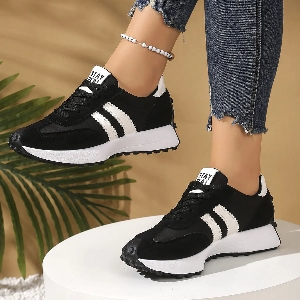 Women's thick bottom breathable casual sneakers in black with PU upper and flat heel