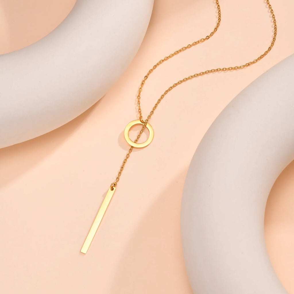 Gold electroplated stainless steel cross and ring geometric pendant necklace on O-link chain