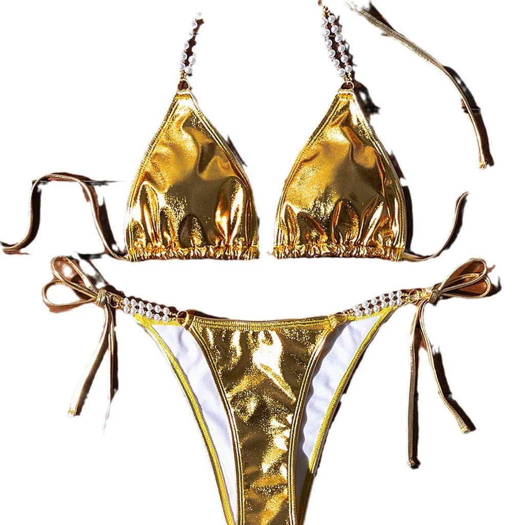 Gold halter bikini with lace-up front and pearl chain detail, brief cut swimsuit