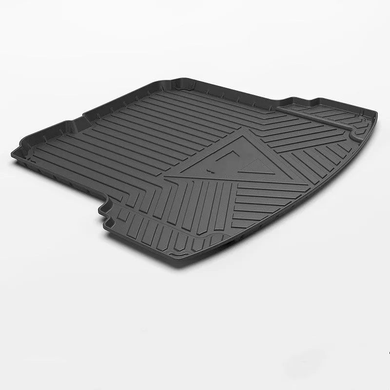 Black car boot protective mat with carbon fiber texture pattern, made from TPO+TPV material.