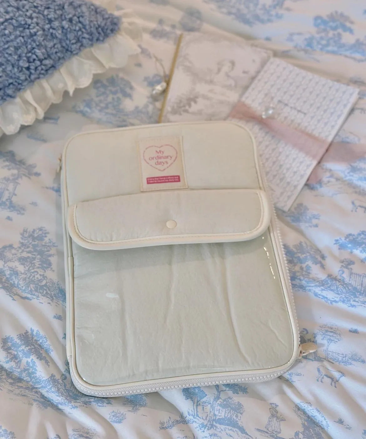 Nylon tablet PC bag with snap pocket closure in multiple colours showing size comparison
