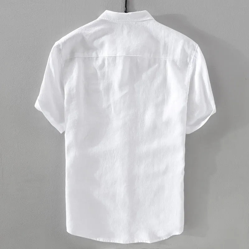 Men's solid colour short sleeve linen blend shirt on a hanger, showing loose fit.