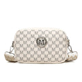 Black crossbody bag with wide strap and a three-dimensional front pocket.