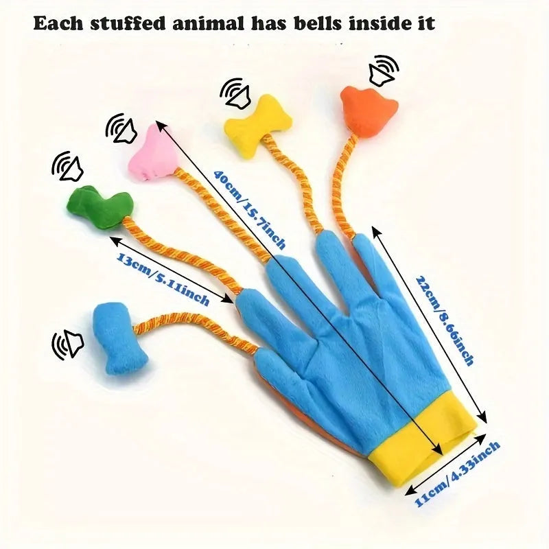 Yellow and blue plush cat toy glove puppet with a bell, shown on a hand.