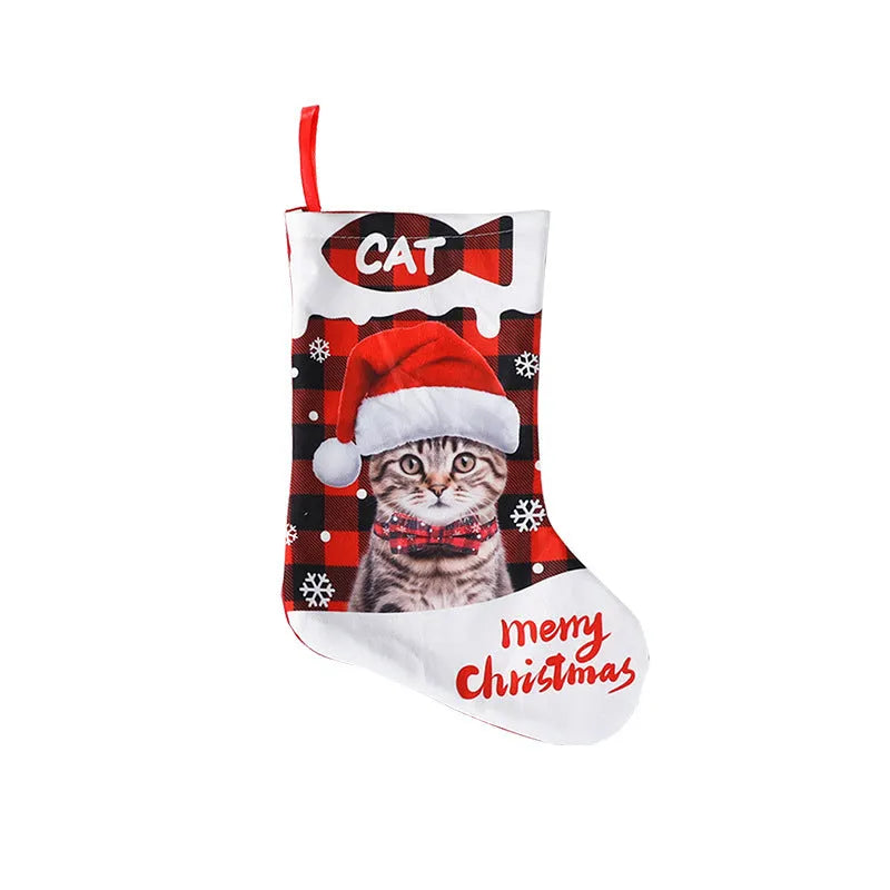 Printed cloth Christmas decoration with puppy or cat design in plaid colours measuring 26x36cm