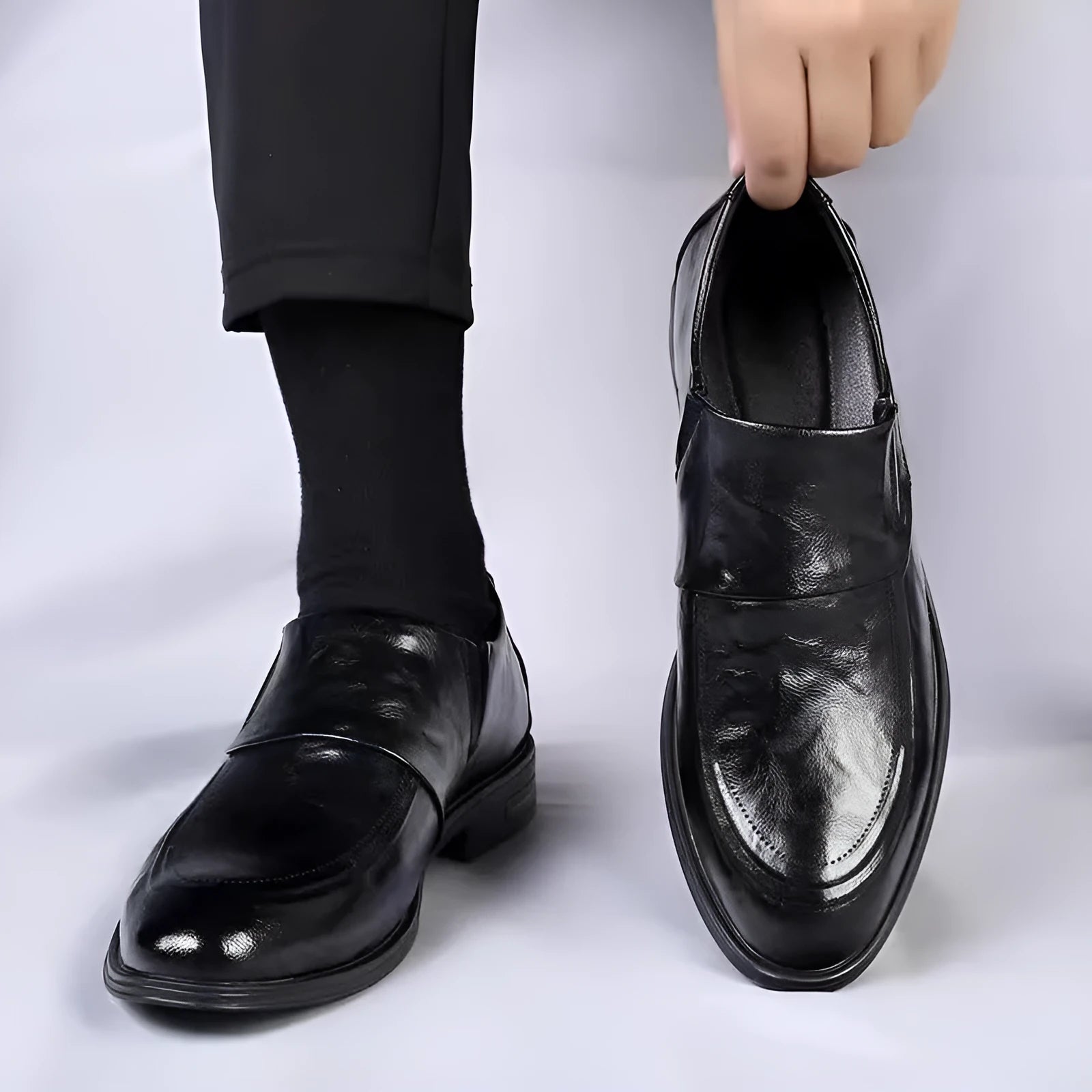 Men's black cowhide leather slip-on casual shoes with rubber sole