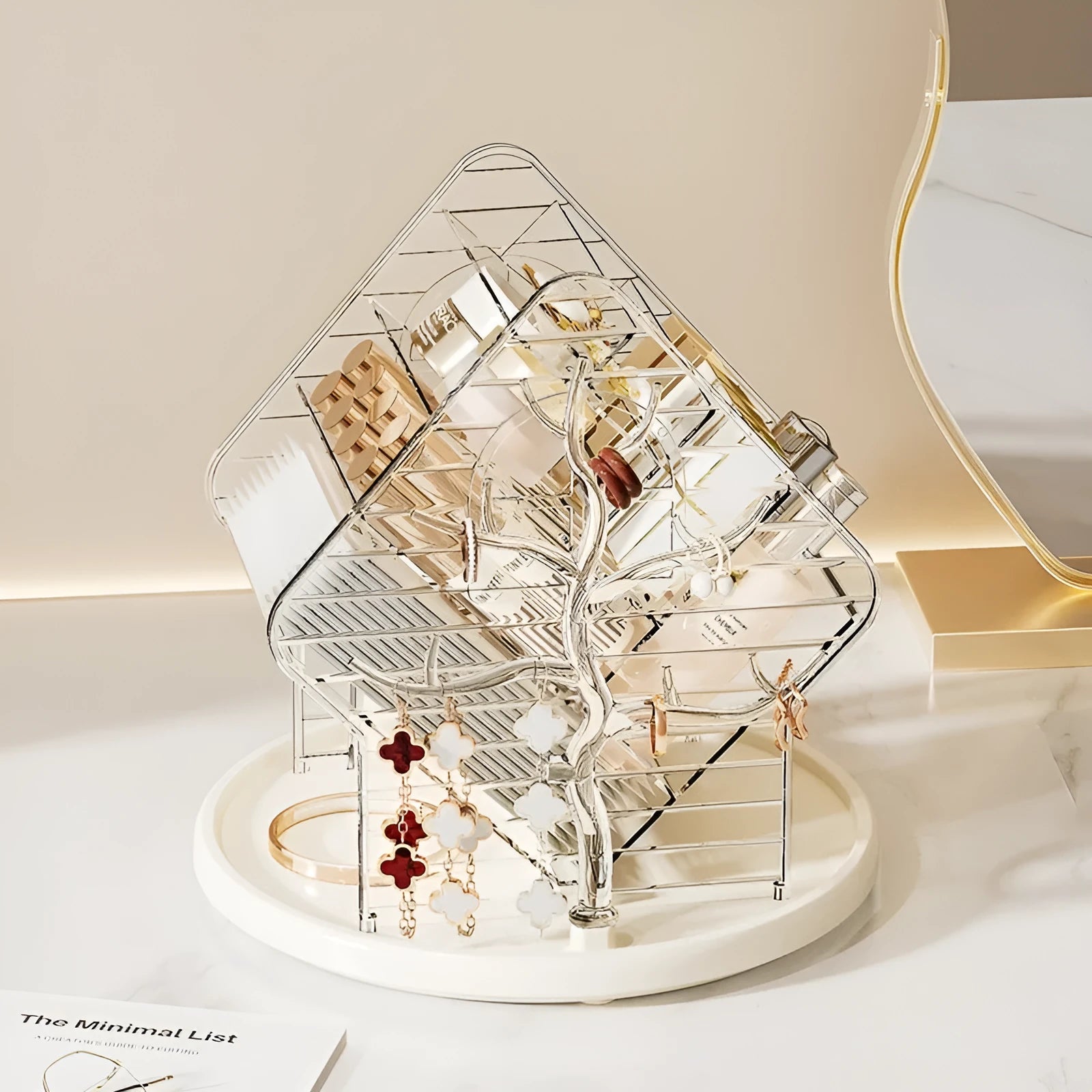 Rotating amber gold cosmetics organiser on a vanity with makeup bottles.