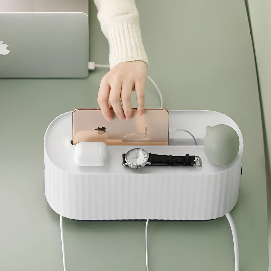 Blue and white HIPS plastic power strip storage box with lid open, showing cable holes and interior space.
