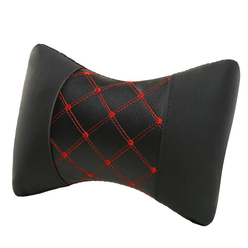 Black quilted artificial leather car headrest pillow for cervical neck support.
