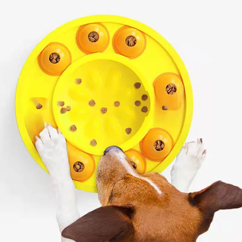 Lake blue interactive dog slow feeder bowl with central column and food turntable on a floor.
