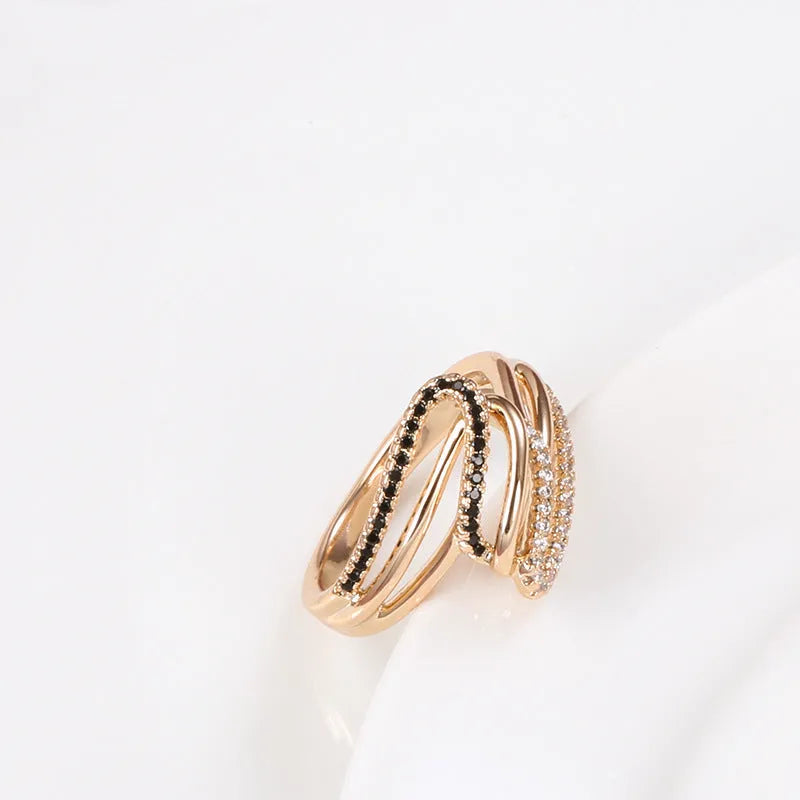 Close-up of a women's copper ring with micro-inlaid zircon stones and a silver-toned electroplated finish.