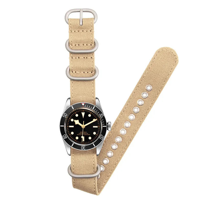 Canvas nylon thickened watch band in army green with silver buckle on a wrist