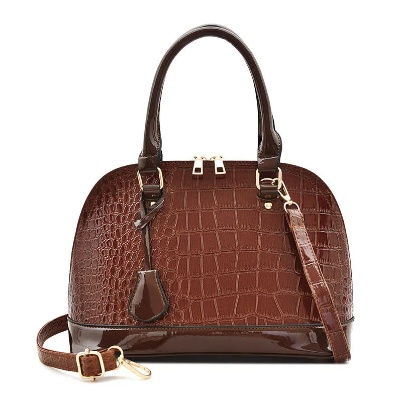 Large shiny black PU leather crossbody bag with shell shape and adjustable strap