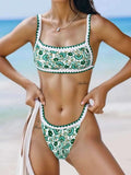 Polyester bikini swimwear set in a solid colour on a mannequin, showing the briefs and backless design.