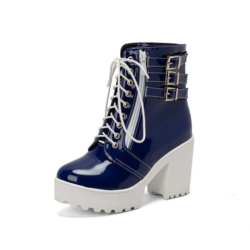 Women's black thick heel ankle boots with round toe and front lace-up on a waterproof platform.