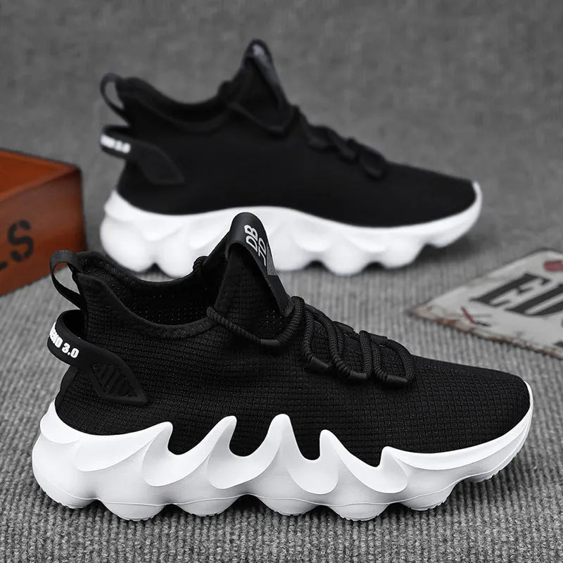 Men's black sock-like low-top sport shoes with a flat heel and round toe on a white background.