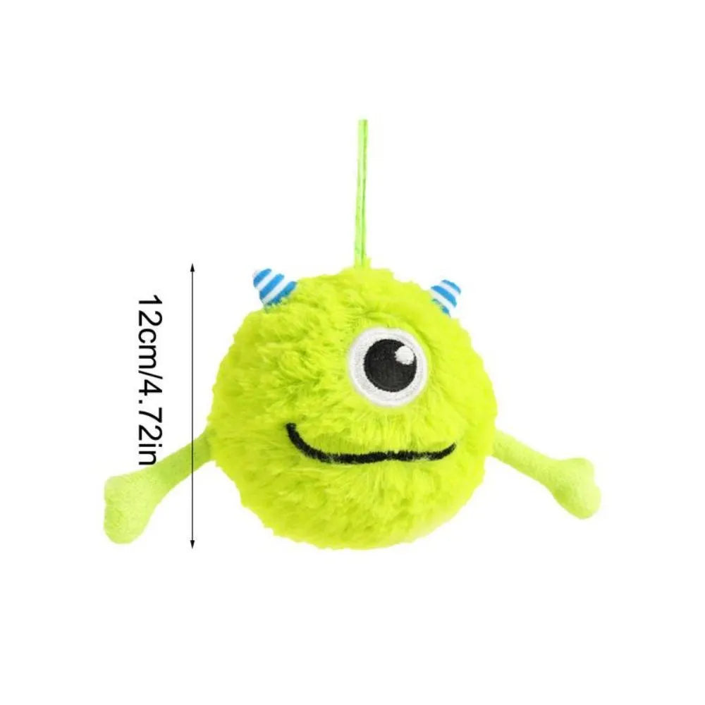 Green plush and TPR sound-activated dog teething toy ball, 12cm diameter.