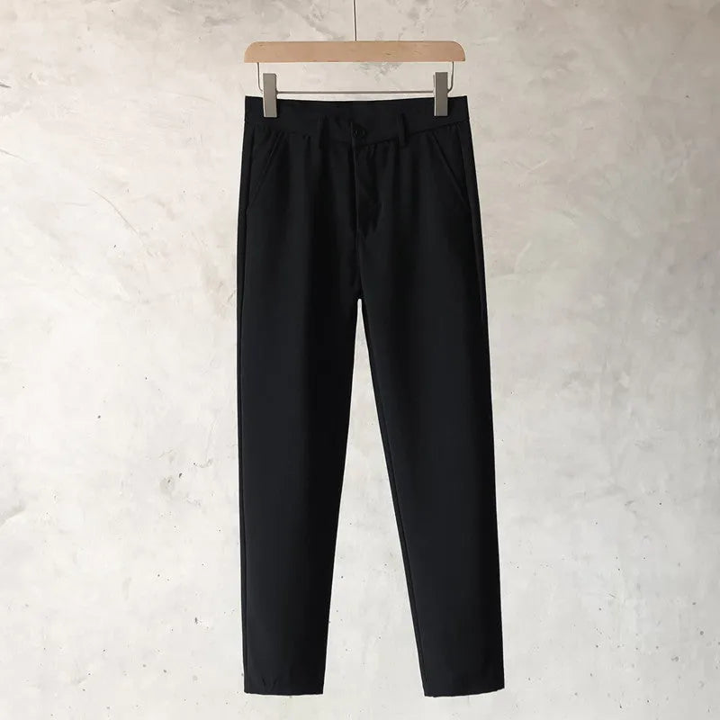 Boys slim straight wool trousers in tapered cut for business casual and street fashion.