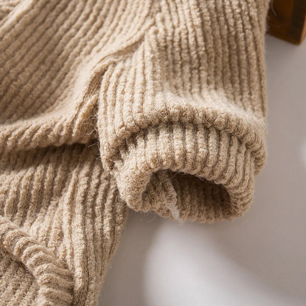 Brown cloth sweater pullover on a small dog, suitable for Bichon or Pomeranian breeds.