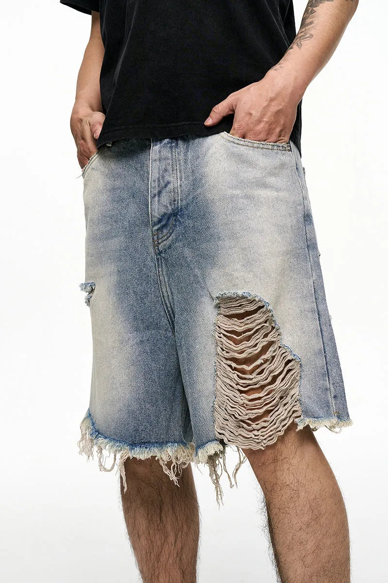 Light blue men's baggy denim shorts with wide leg cut and retro washed finish