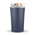 Blue mini food grinder and flour mill with stainless steel construction on a kitchen countertop.
