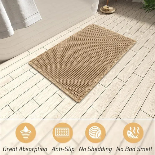 A square, checkered-pattern bathroom carpet in a choice of colours on a tiled floor.