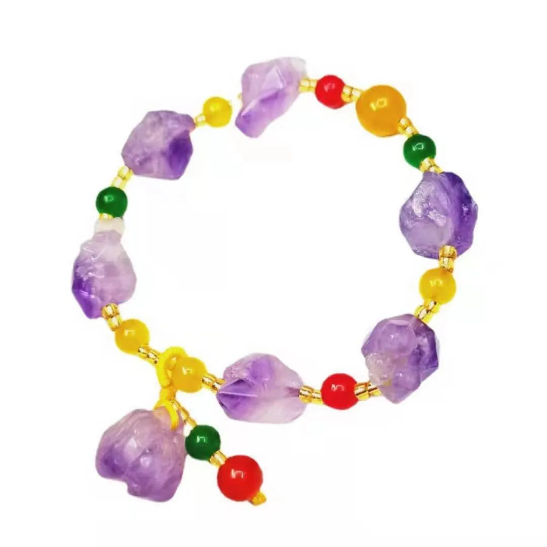 Natural shaped purple amethyst bead bracelet with a fu character charm for women.