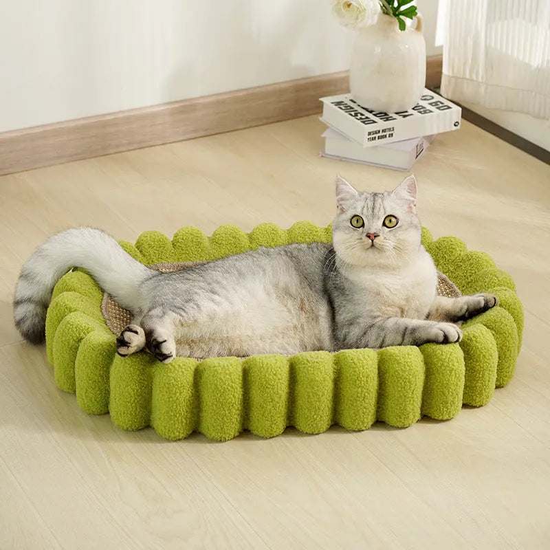Green oval cat scratch pad bowl bed made from sisal measuring 650mm by 420mm
