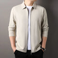 Men's black polyester jacket with long sleeves and a straight hem on a hanger.