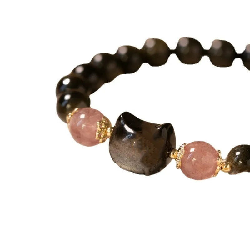Black obsidian 8mm bead bracelet with silver kitty charms on adjustable closure