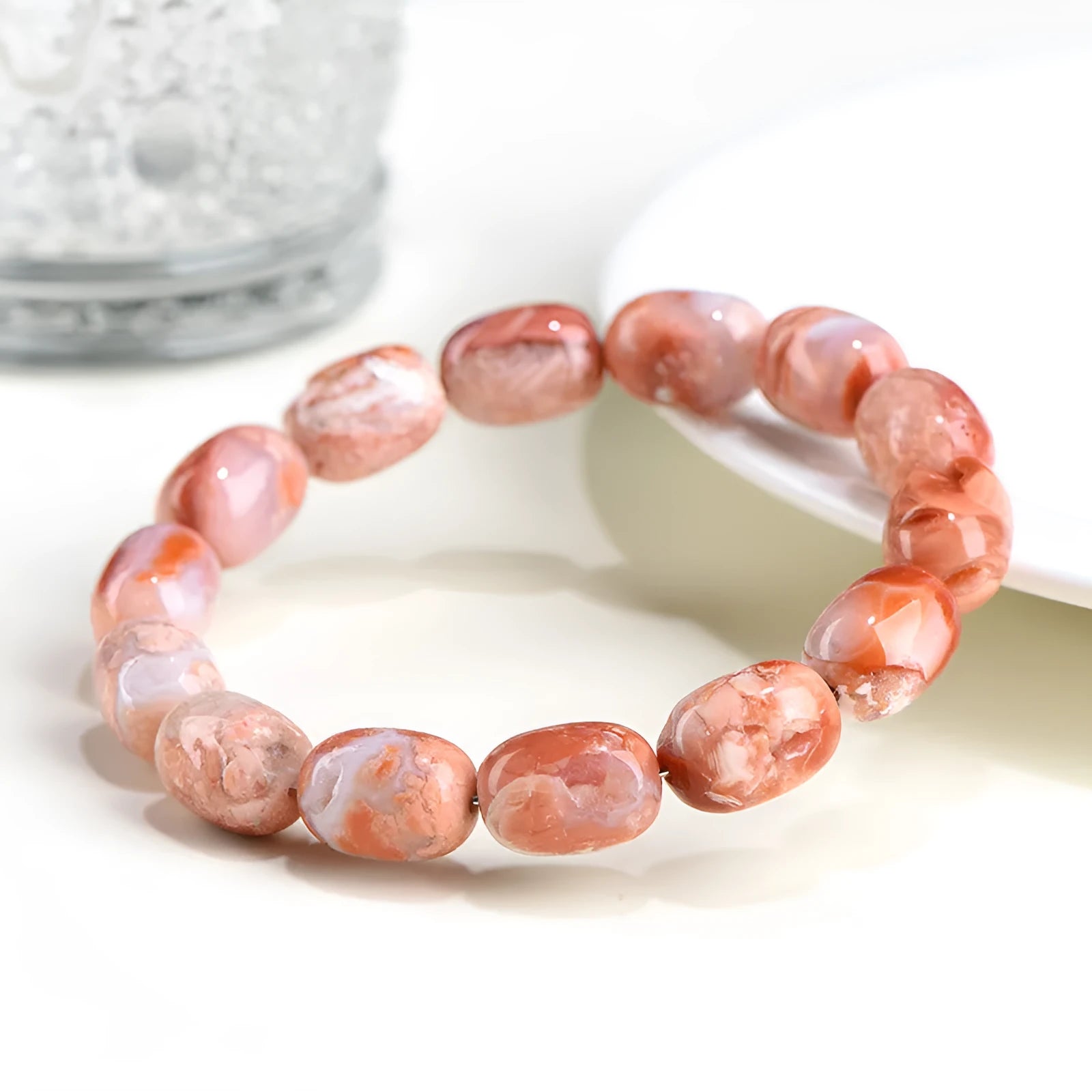 Natural cherry agate barrel bead bracelet with 10x14mm ruyi motifs geometric design