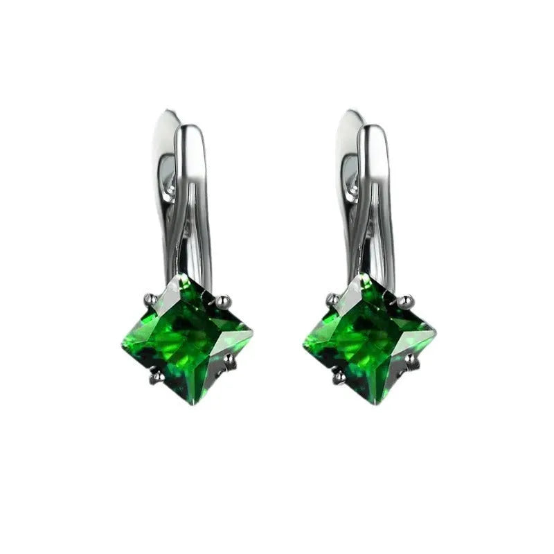 Women's copper diamond design earrings with inlaid zircon detail in blue, green, and colour variations.