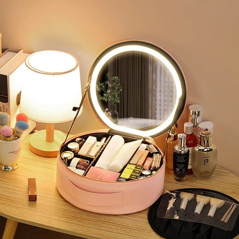 Round cherry blossom pink PU leather makeup bag with a lit LED mirror inside, showing internal partitions.