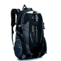 Large black Oxford cloth travel backpack showing dual shoulder straps, front compartments, and substantial 31x51x19cm dimensions