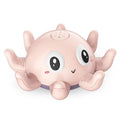 Blue octopus automatic water spray bath toy with flashing lights on a white background
